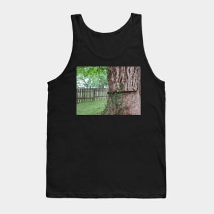 A tree and a fence Tank Top